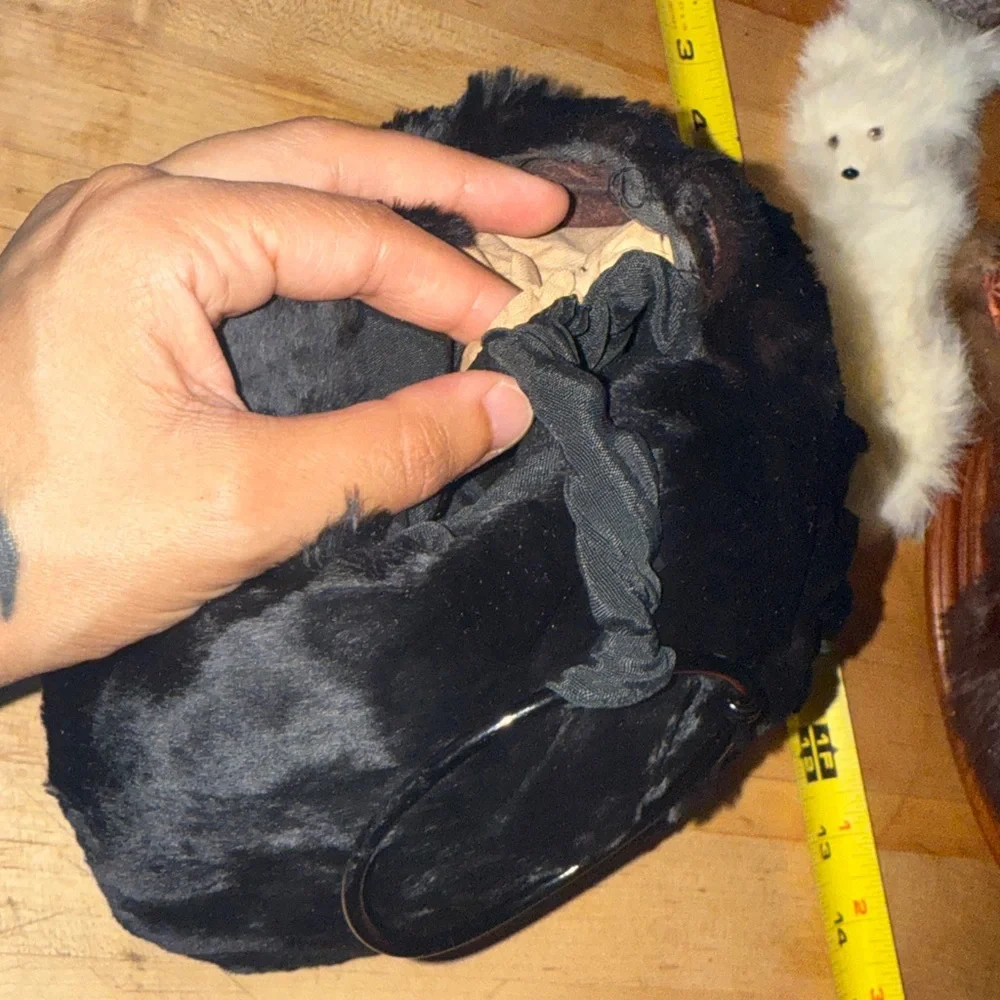 Vintage child’s seal fur muff hand warmer in black.